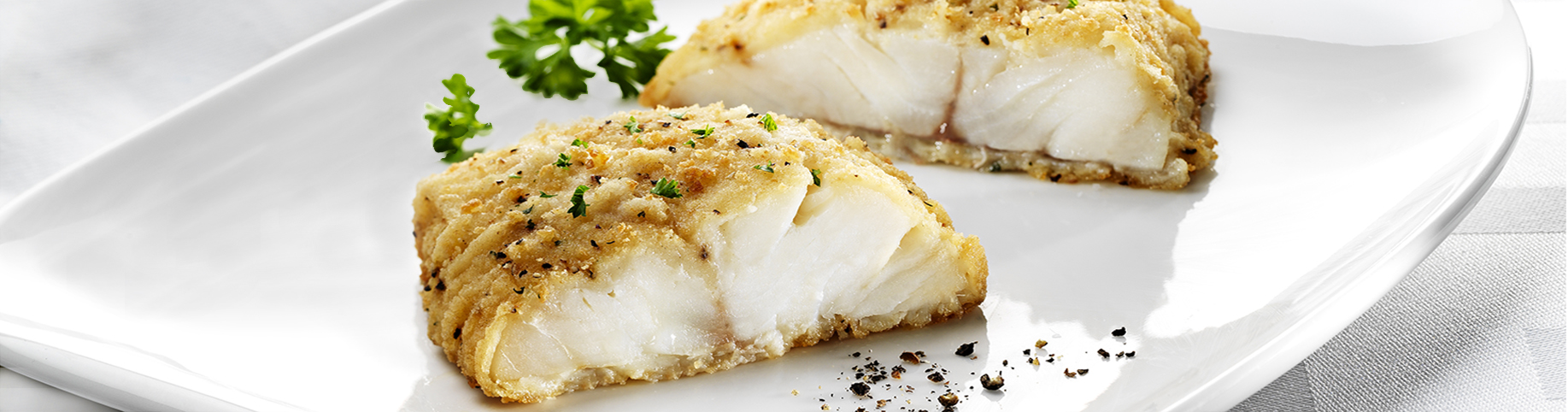 Close up of a crispy and delicious breaded fish fillet.